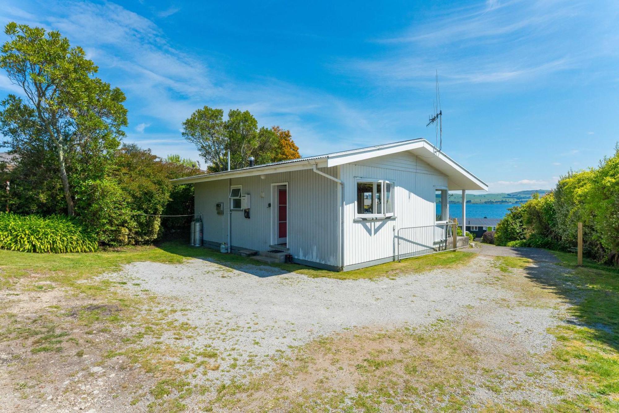 Lakeview Cottage - Rainbow Point Holiday Home Lac Lac Taupo Extérieur photo
